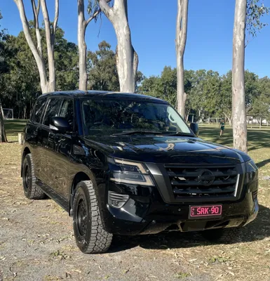 Detailed black Nissan Patrol with a high-gloss finish after mobile car detailing in Caloundra