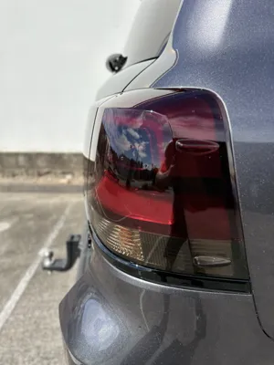 Grey Land Cruiser taillight close-up demonstrating gloss from mobile car detailing in Noosa