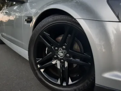 Silver car SV6 wheel and paint polish after mobile car detailing in Maroochydore