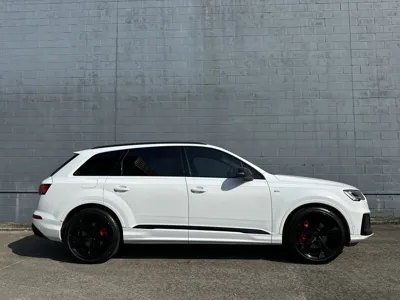 White Audi Q7 e-tron side profile following a full exterior mobile car detailing in Noosa