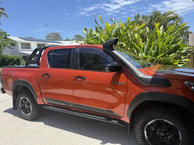 Full Satin Orange Toyota Hilux Wrap in Twin Waters